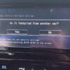 Car security setup screen displaying installation confirmation prompt.