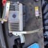 Automotive engine control unit for diagnostics and repair, essential for vehicle maintenance.