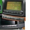 NavigationDisk car audio and navigation system interface with touchscreen display and control button.