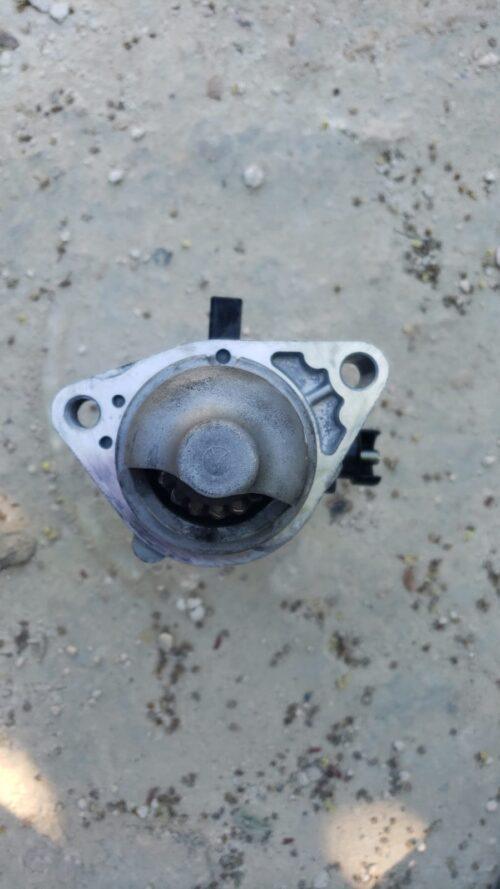 Engine water pump for car cooling system, essential for engine performance and temperature regulatio.