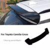 Rear spoiler for Toyota Corolla Cross in sleek stoving varnish black finish. Enhance your vehicle's.