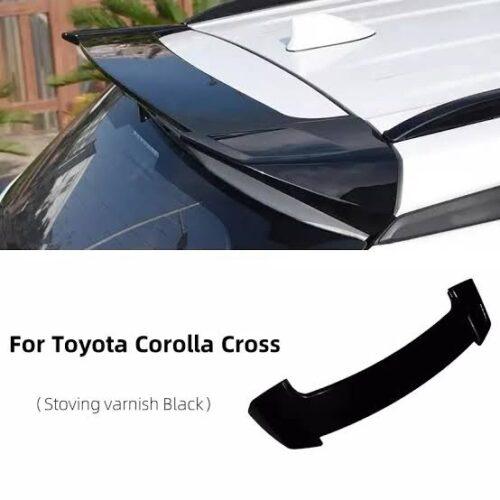 Rear spoiler for Toyota Corolla Cross in sleek stoving varnish black finish. Enhance your vehicle's.