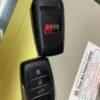 Car key and remote fob for Toyota and GLC vehicles, showing lock, unlock, and trunk buttons.