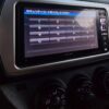 Enter security code on car infotainment screen in Japanese.