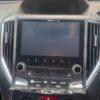 NavigationDisk car infotainment system with touchscreen display in vehicle dashboard.