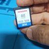 SD card for Nissan vehicle navigation system, featuring Japan map data for accurate route guidance.