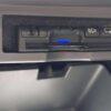 In-car multimedia control panel with NavigationDisk system for vehicle entertainment and navigation.