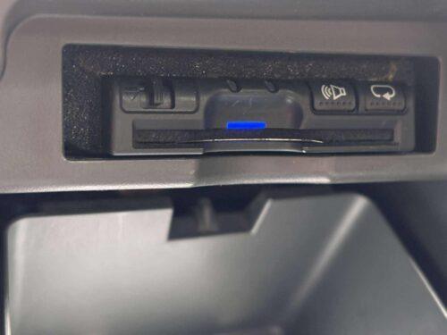 In-car multimedia control panel with NavigationDisk system for vehicle entertainment and navigation.
