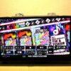 High-quality navigation disk interface displaying karaoke song selection and control options.