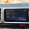 Car security system display showing serial and management numbers.