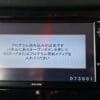 A detailed car navigation system screen displaying setup instructions in Japanese.