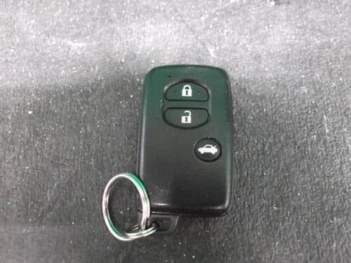 Key fob remote control for vehicle security and access management.