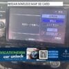 Nissan MM520D car navigation system screen displaying map and settings interface.