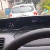 Car dashboard with NavigationDisk system showing speed and navigation info.