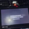 Car navigation system display showing error message "Unable to load program".