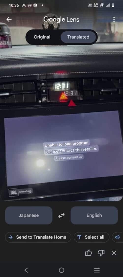 Car navigation system display showing error message "Unable to load program".