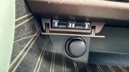 NavigationDisk device in vehicle dashboard for GPS and media control.