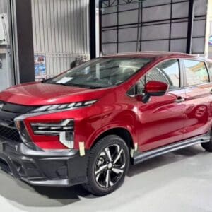 Red Honda SUV displayed at NavigationDisk dealership, showcasing modern design and features.