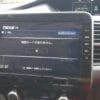 FM/AM radio display in a vehicle dashboard.