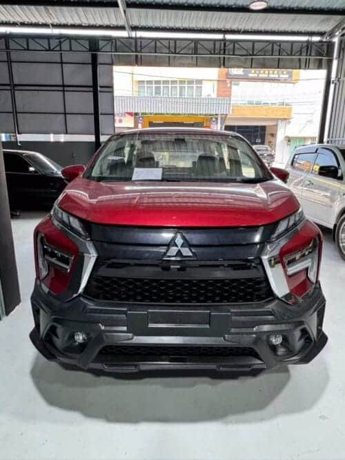 New Mitsubishi SUV on display at NavigationDisk dealership.