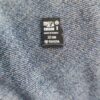 Micro SD card with 32GB capacity on denim background, Toyota branding.