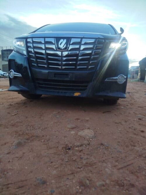 SUV front grille with LED headlights and chrome accents.