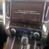 NavigationDisk car infotainment system display with instructions in Japanese.