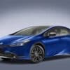 Blue electric sedan car, modern design, eco-friendly vehicle for sustainable driving.