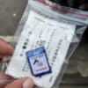 NavigationDisk GPS device for motorcycle navigation, compact and easy to install.