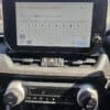 Car infotainment system with NavigationDisk interface for vehicle control.