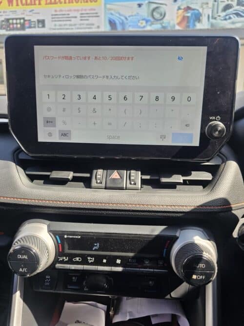 Car infotainment system with NavigationDisk interface for vehicle control.
